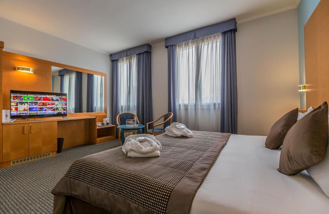 Una Hotels أُكْيوبيلّو المظهر الخارجي الصورة